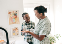 Mother and son smiling